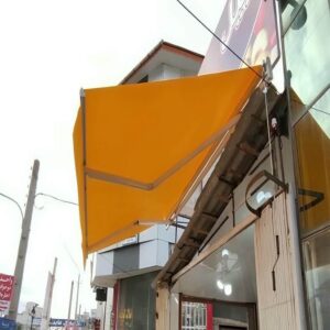 سایبان برقی بازویی با پوشش طولی برای تراس
